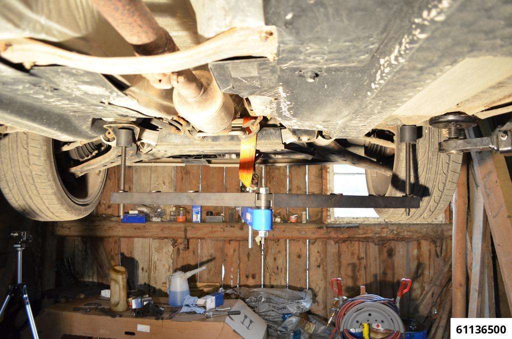 Universal under vehicle engine and gearbox support