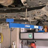 Universal under vehicle engine and gearbox support
