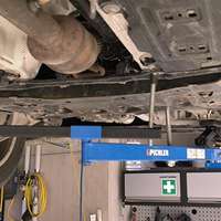 Universal under vehicle engine and gearbox support