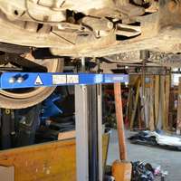 Universal under vehicle engine and gearbox support
