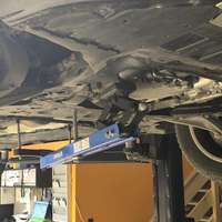 Universal under vehicle engine and gearbox support